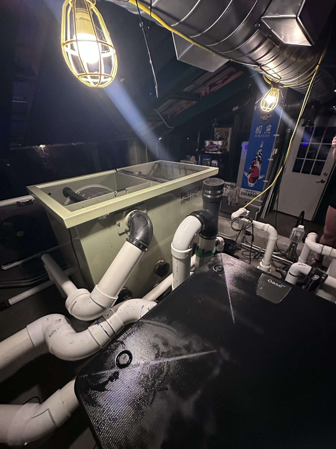 Filtreau gravity filtration system and bio drum installed for a koi pond