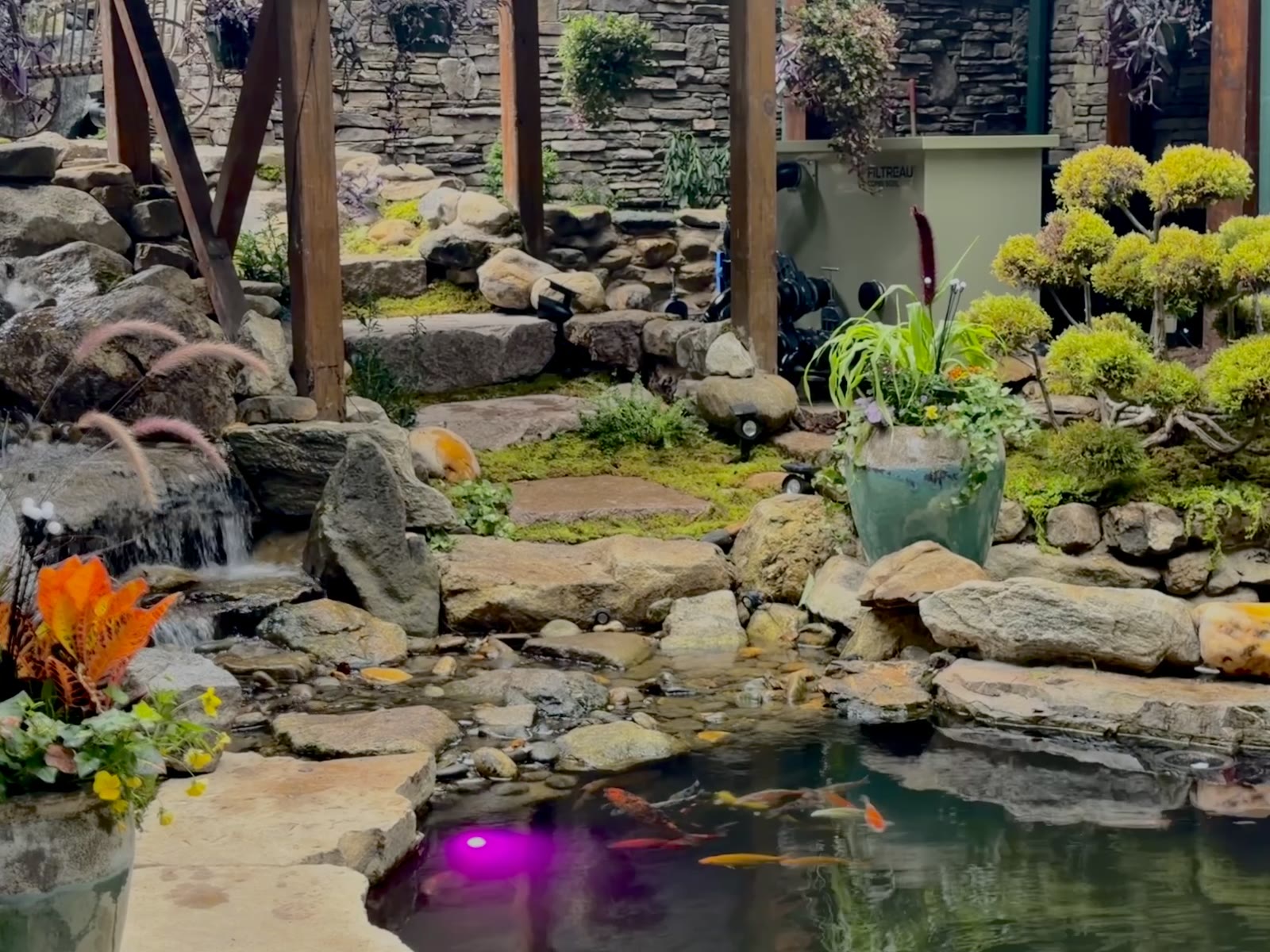 Koi pond with natural stone stream, waterfall and Filtreau gravity filtration